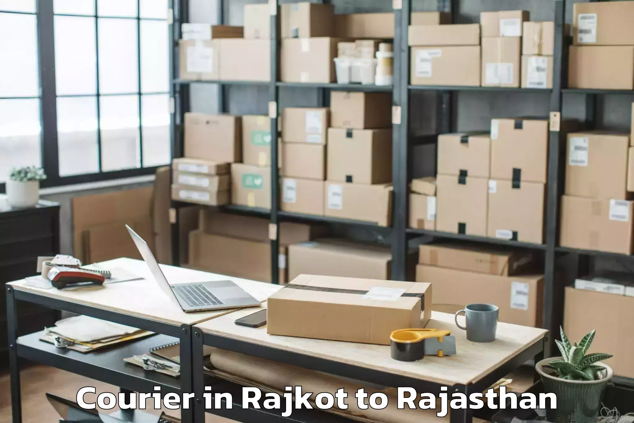 Top Rajkot to Padampur Courier Available